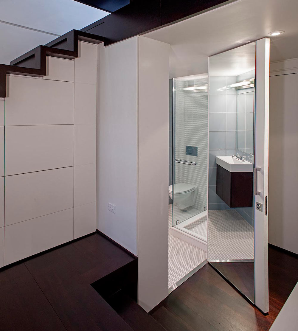 Bathroom with Floor to Ceiling Mirrored Door