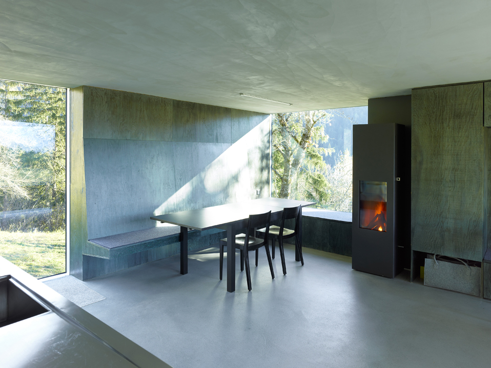 Concrete Downstairs with Minimalist Wood Burning Stove
