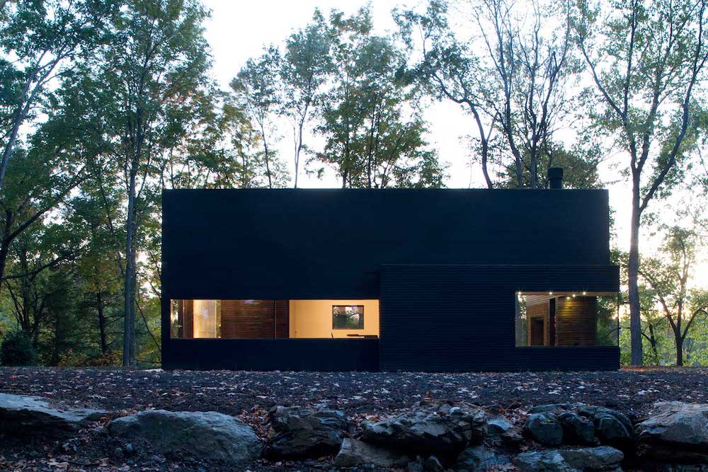 Side View of Ghent Writer's Studio in Forest Woods Setting