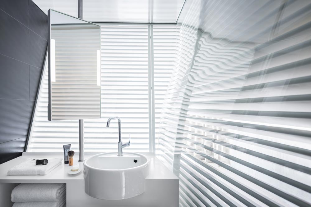 Curved Louvred Wall of Okko Hotel Bathroom
