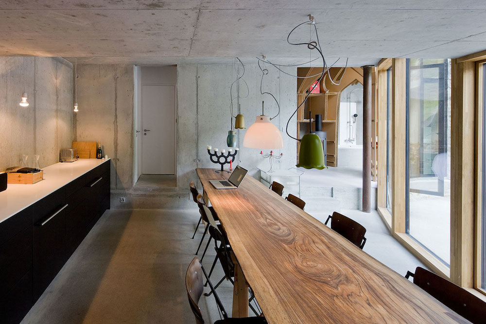 Minimalist Kitchen Dining Area in Villa Vals by SeARCH & CMA