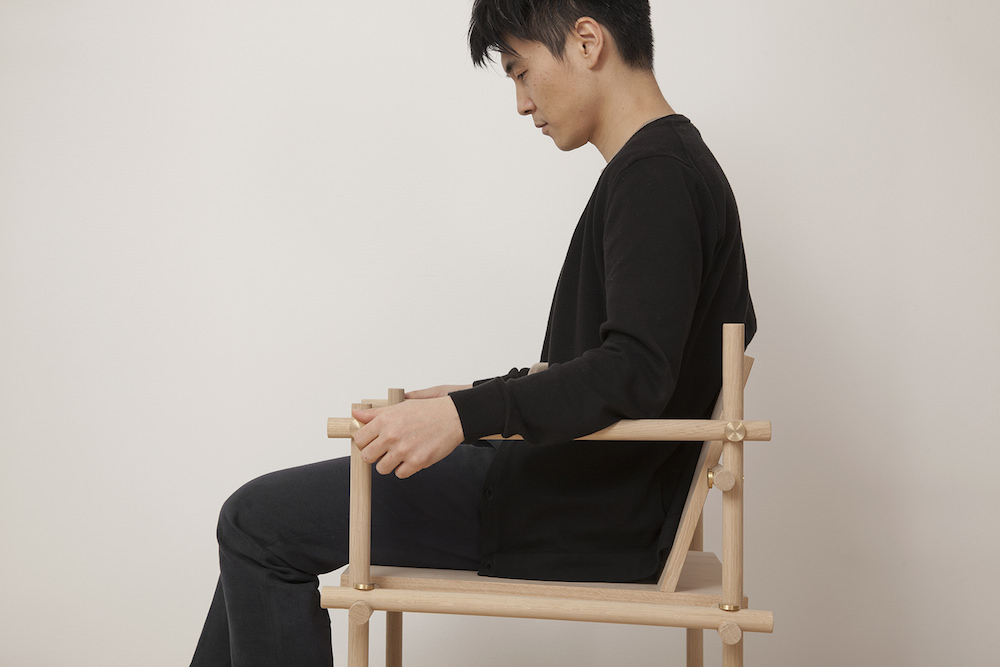 Sangheok Lee sitting in Useful Chair