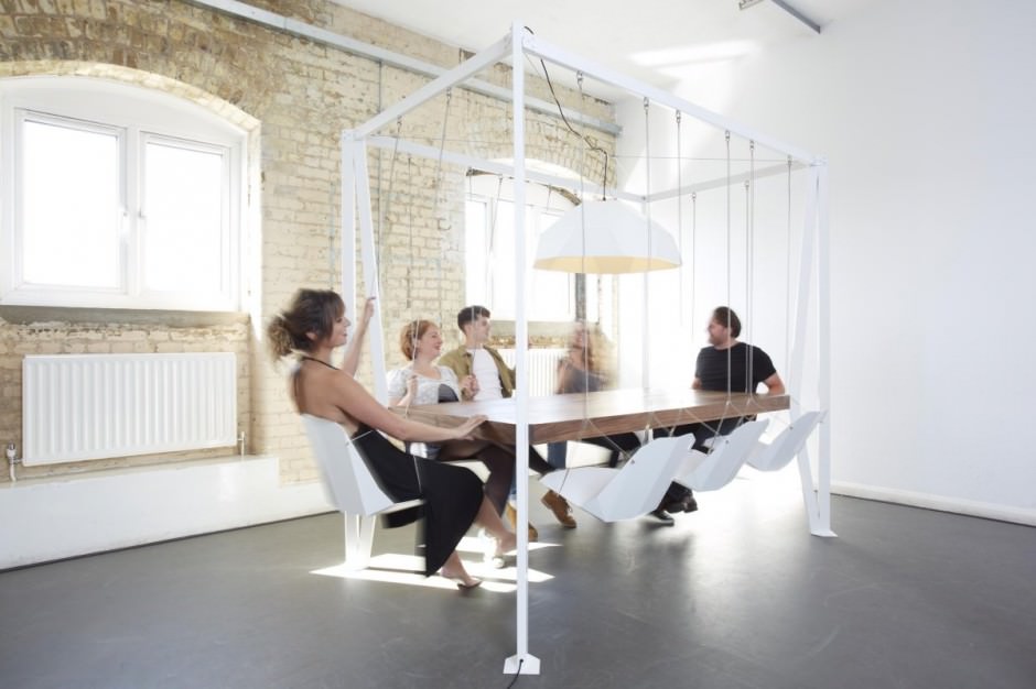 People Sitting at one of Christopher Duffy's Swing Tables