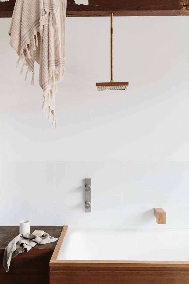 Brass, Wood and Concrete Bathroom