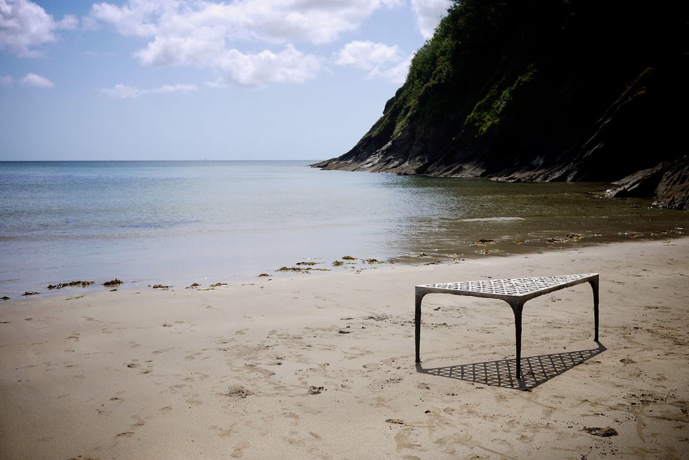 Max Lam's Pewter Desk on the Beach