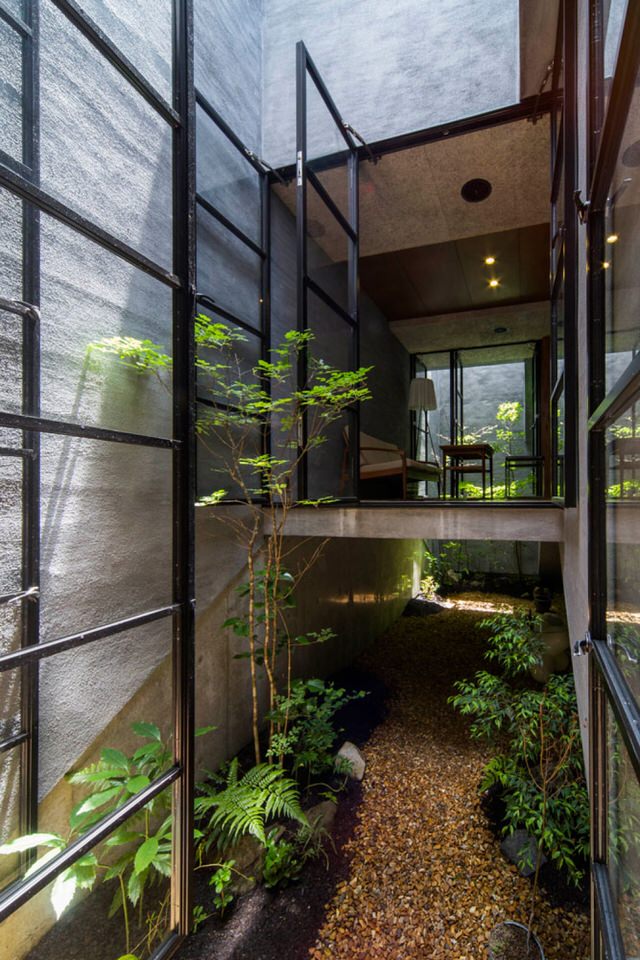 Black Framed Windows and Multi-Height Floors of Nara House by Fuji Architects