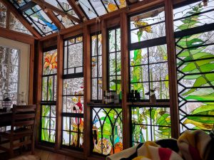 Stained Glass Forest Cabin by Neile Cooper