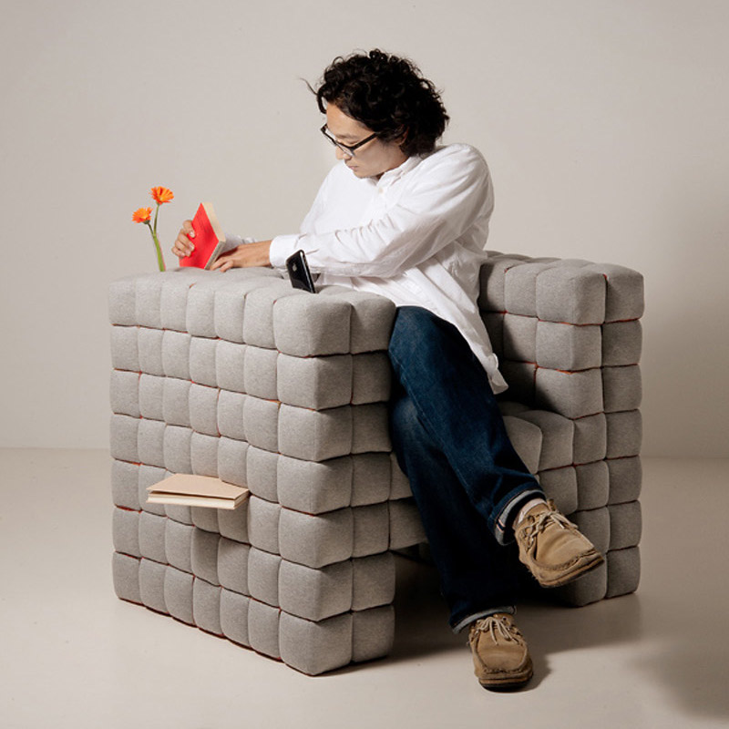 Designer Daisuke Motogi Sitting in a Lost In Sofa