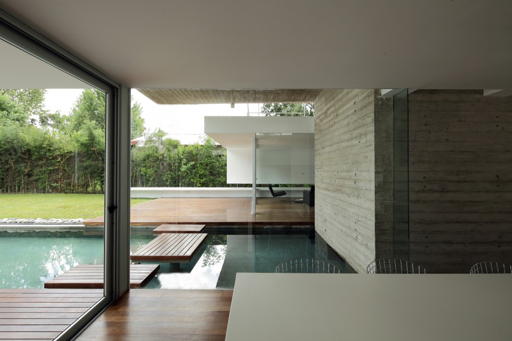View of Pool from Dining Area Through Transparent Membrane