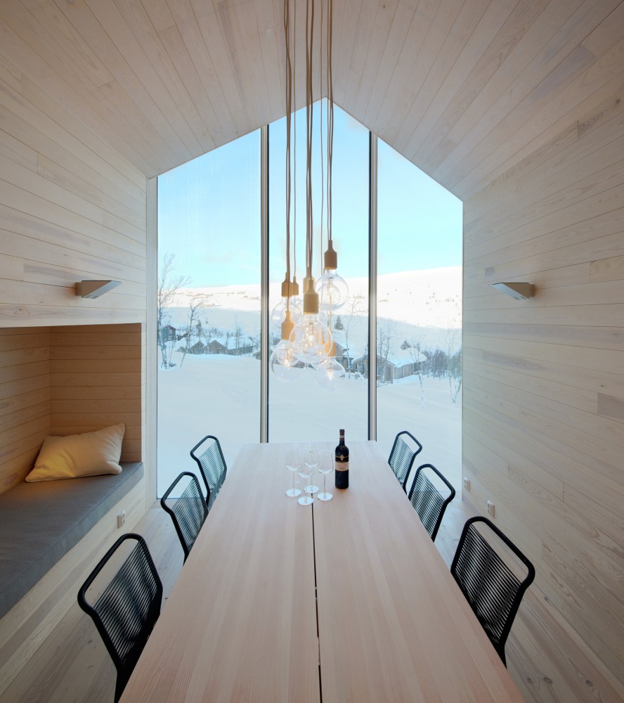 Dining Area with Pure Timber Cladded Interior and Pitched Roof with Gable Window