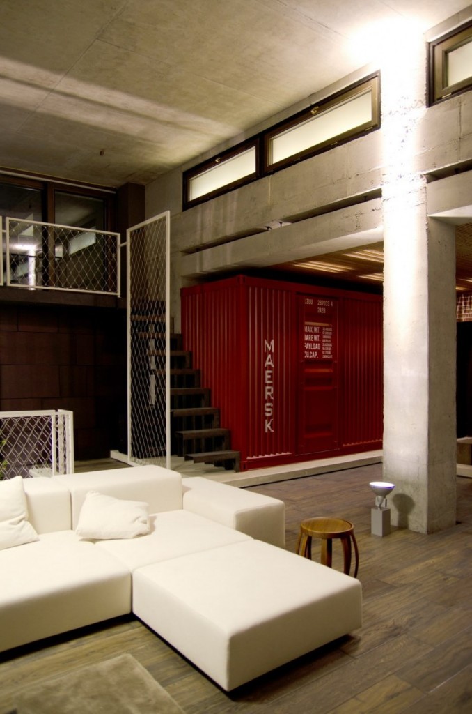 Red Maersk Shipping Container in Industrial Loft Apartment by 2B Group