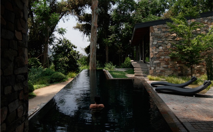Swimming Pool of Casa Lo Curro amongst Forest and Natural Stone Walls