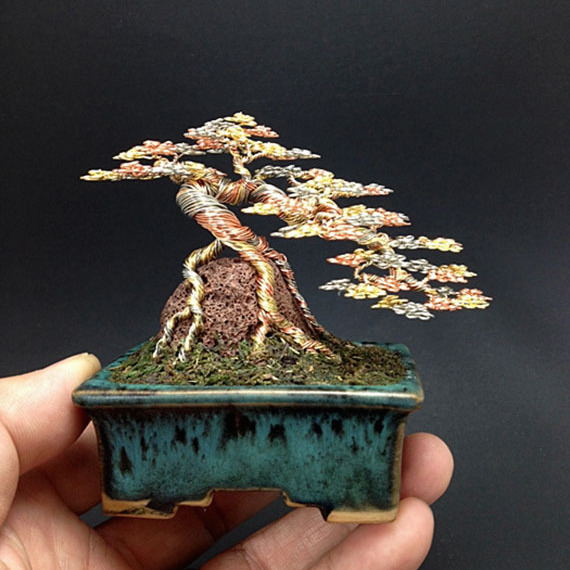 Cascading 3 color bonsai tree on rock by Ken To