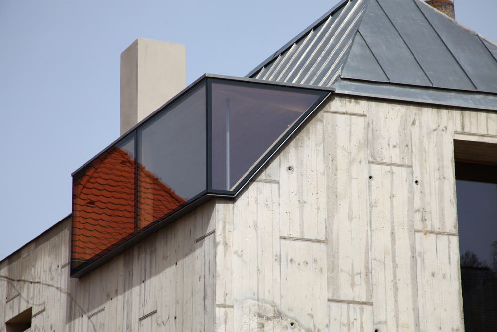 Stainding Seam Metal Roof of House Over The Alley by Koeberl Doeringer Architekten