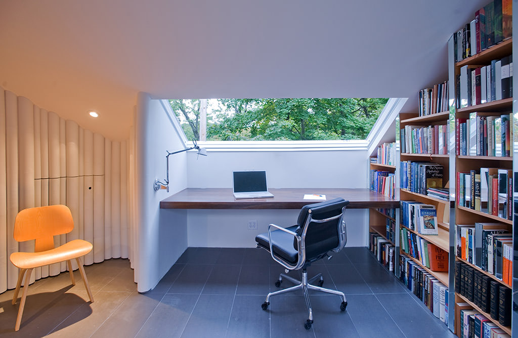 Writers Desk with bookshelf and skylight in loft renovation