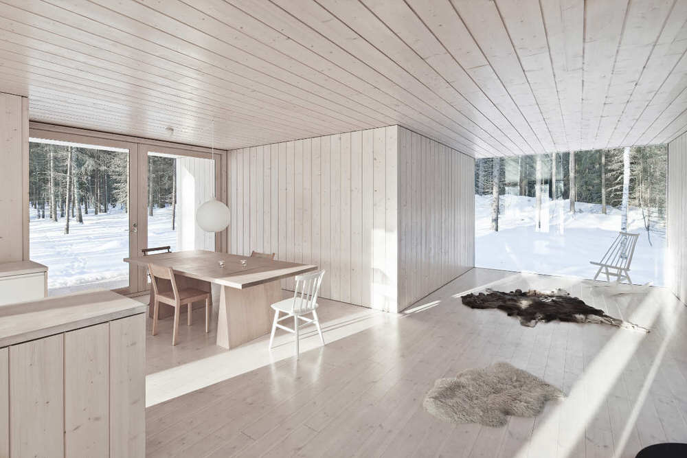 Minimalist Interior Design and Full-Wall Windows of Four Cornered Villa