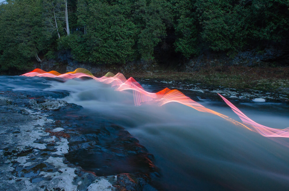 LED Motion Exposure Photograph with White Water Kayaking Paddle