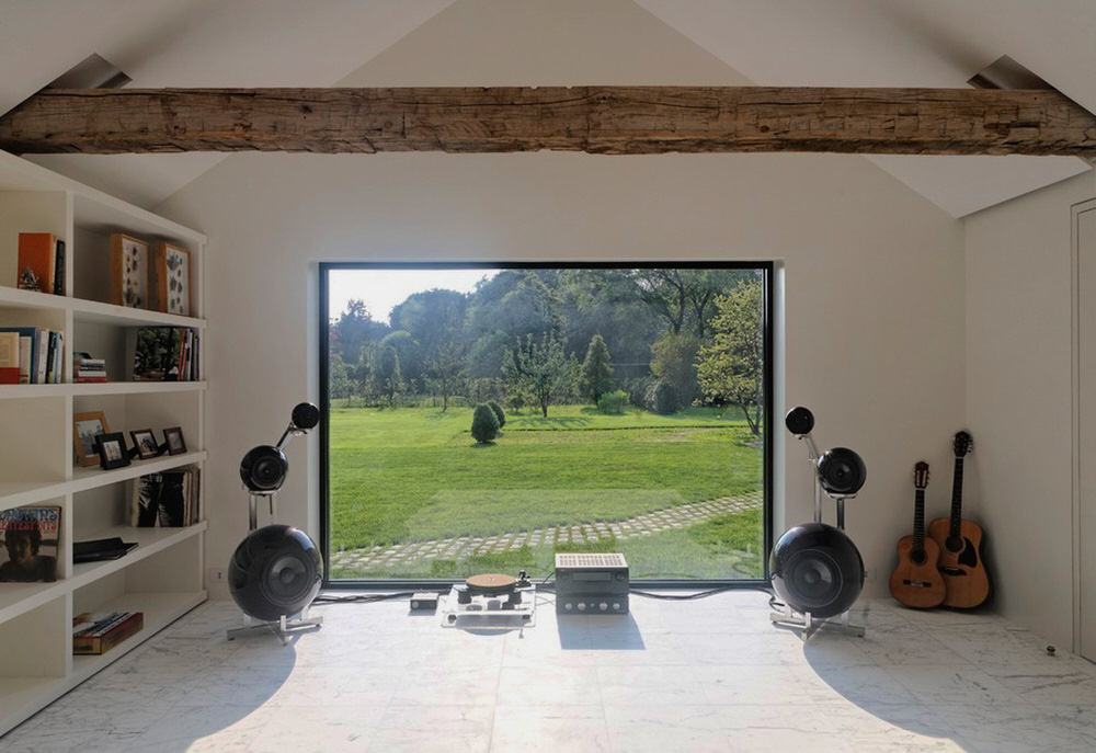 Music Room with Large Window Overlooking Garden