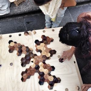 The Grid Game: Hexagonal Wooden Dominoes by Estudio Victor Alemán