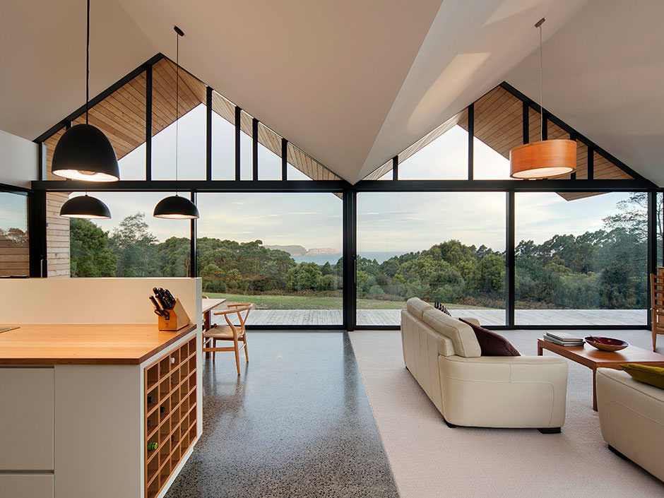 Peaks and troughs of gable roofs defining living spaces