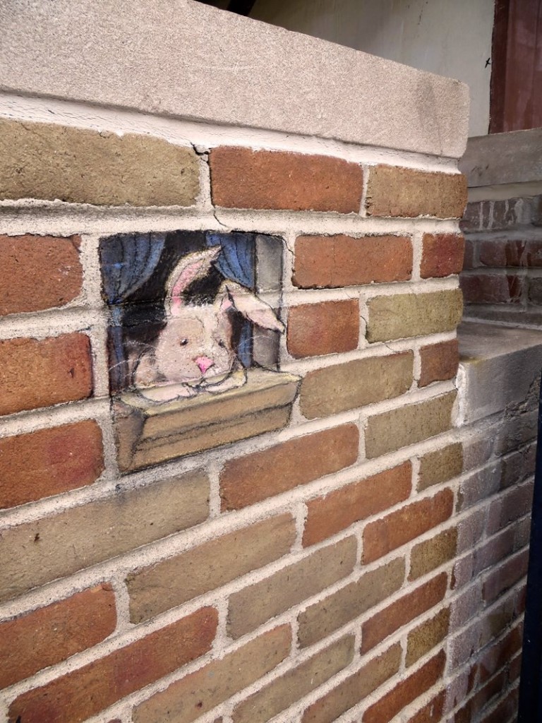 Trompe L'oiel Window ledge on a brick wall by David Zinn in Chalk