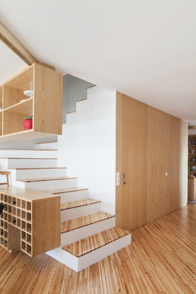Diagonal Wood Flooring and Staircase at Silverwood House by Ernesto Pereira
