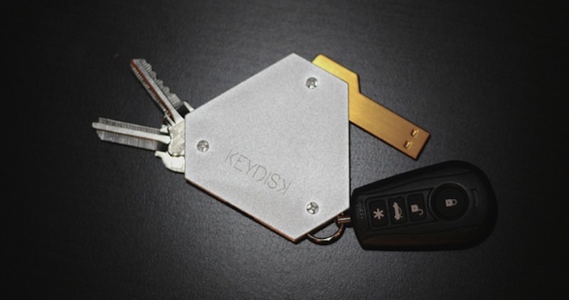 Versatile KeyDisk Holding USB Flash Drive and Car Keys