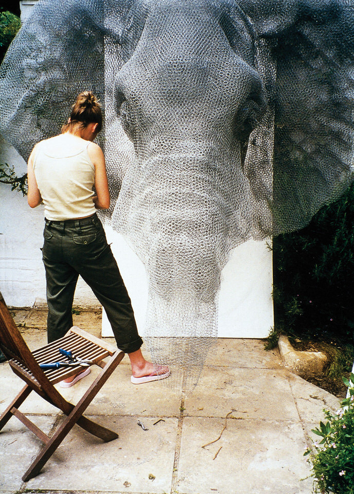 Kendra Haste Working on Elephant Head Chicken-Wire Sculpture