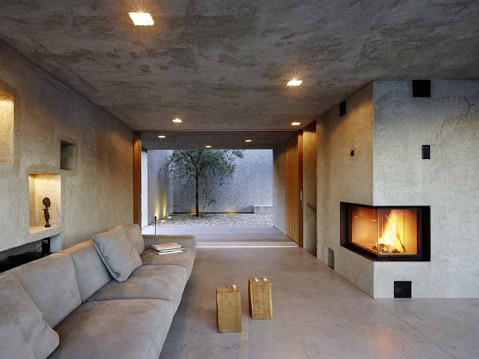 Living Room through to Courtyard with Corner Fireplace