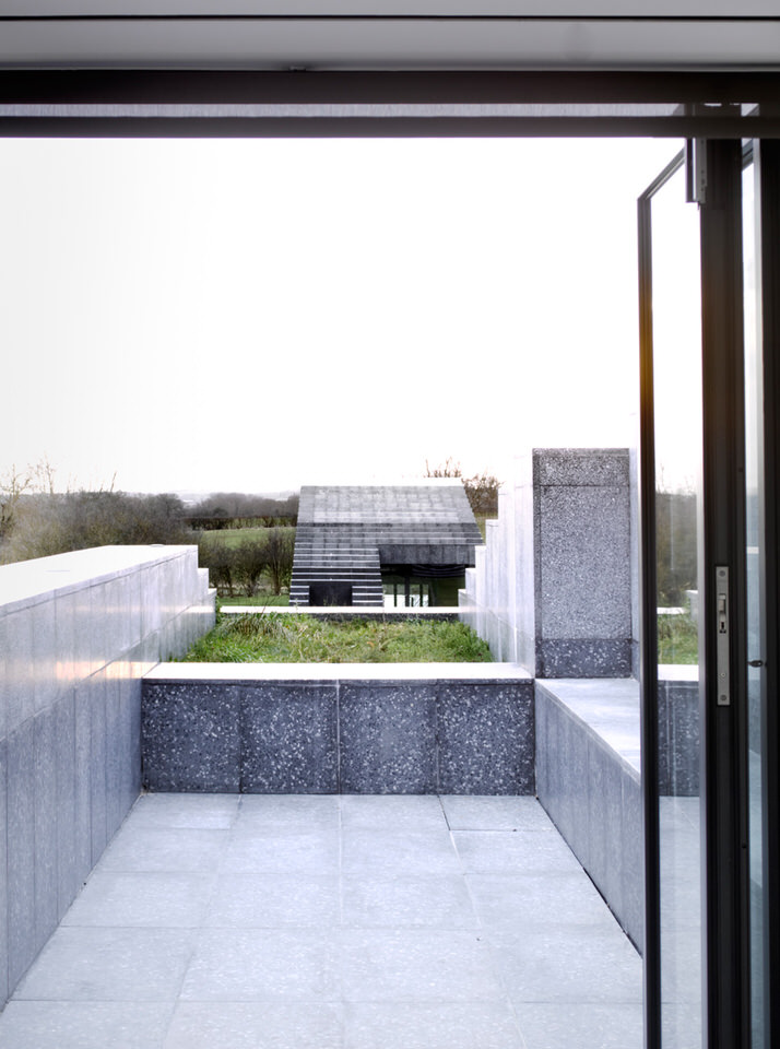 Balcony Terrace Cut into the Stepped Roof of Flint House