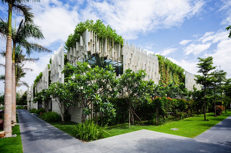 Exterior of Naman Spa in Vietnam with Plants Amongst White Lattice