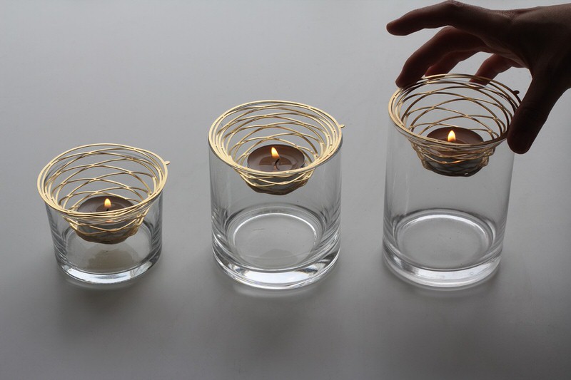 Brass Pop Up Candle Holders Suspended in Glasses