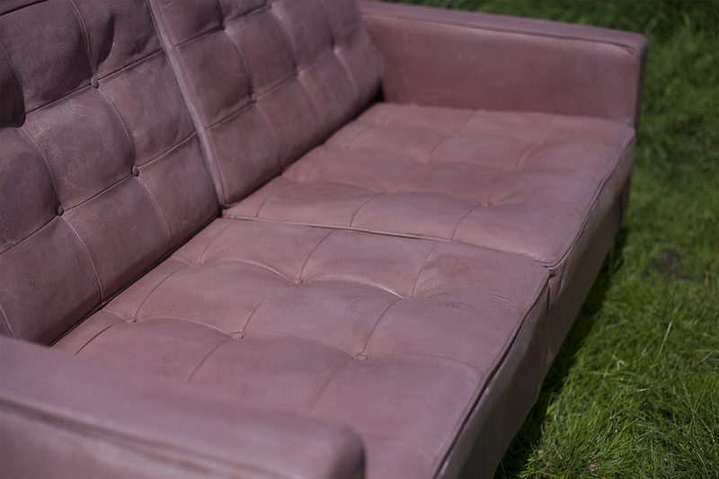 Sitting Surface and Buttoned Leather Surface of the Concrete Sofa