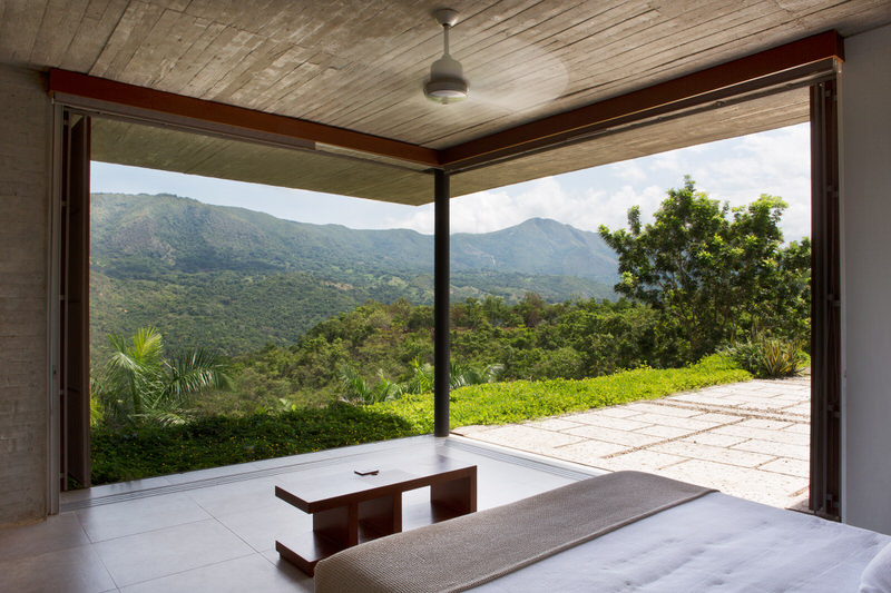 vast-open-wall-of-nilo-house-bedroom-looking-over-colombian-mountains