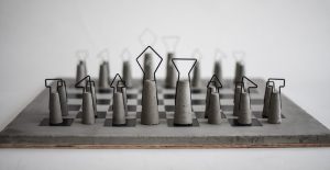 Fortify Chess Set in Concrete by Daniel Skoták